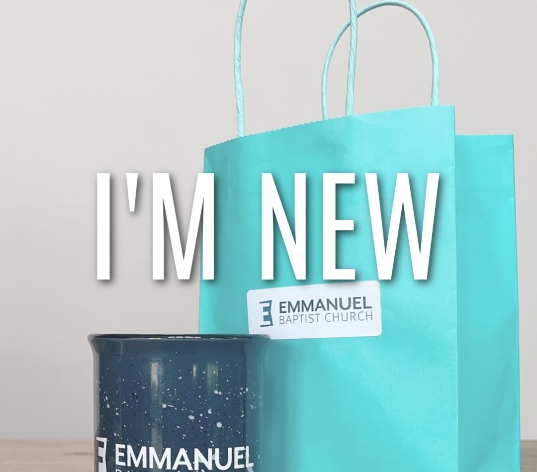 teal bag with black mug and white lettering