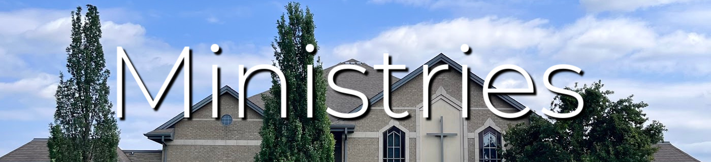 Church building with trees and white fluffy clouds, white lettering