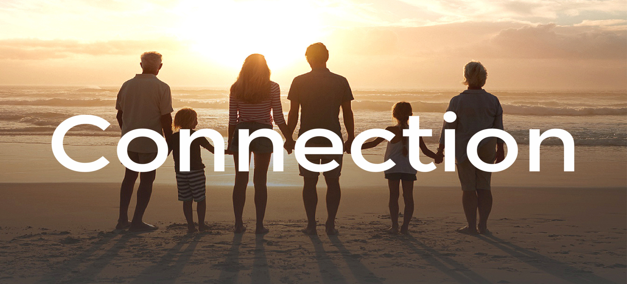 Connection banner with family standing on beach at the sunset